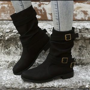 Women’s size 8.5 black boots with buckles